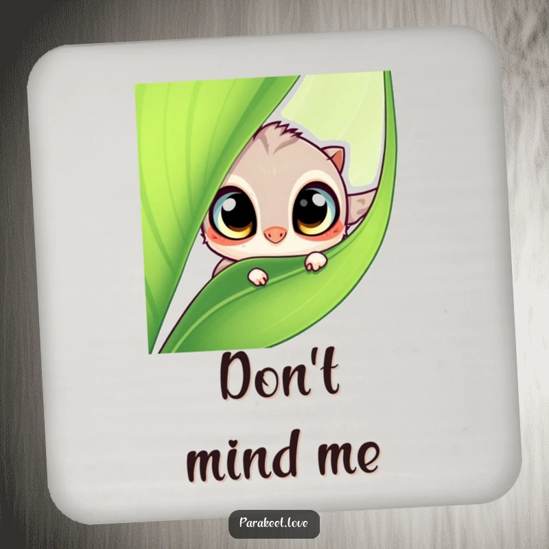 Funny drink coaster featuring a small, curious winged creature peeking from a green leaf. Protects surfaces with humor.