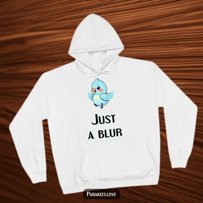 Funny blue parakeet hoodie illustrating a tiny bird in a dizzying spin, a fantastic piece of humorous aviary art.