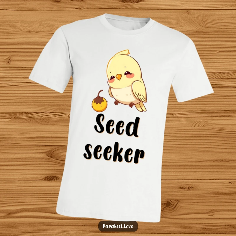 Funny budgie t-shirt illustrating a cheerful bird with intense focus pecking at an imaginary seed, capturing a moment of pure delight.